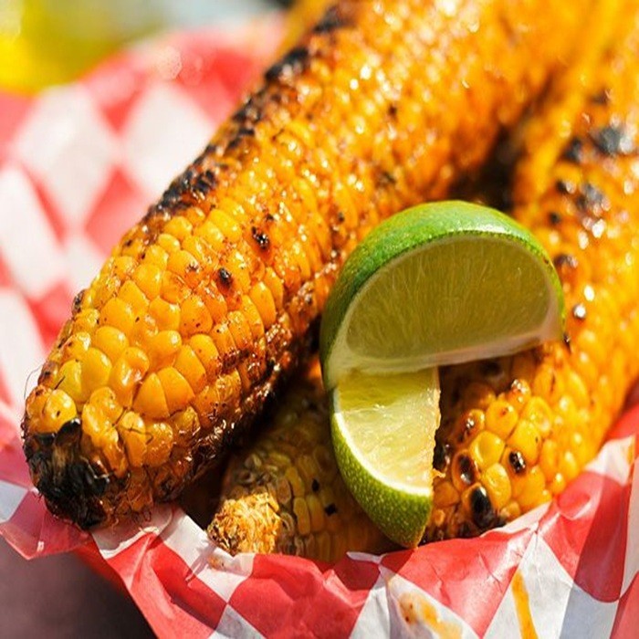 Corn on the cob with lime, green chilli and coconut butter